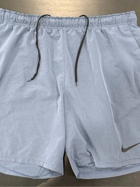 Nike Men's Pale Blue Athletic Shorts with Black Drawstring